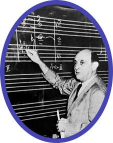 A rare photo of Arnold Schoenberg giving a harmony class at UCLA, where he taught from 1936-1944.